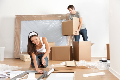 Professional movers handling household items in Kingston upon Thames