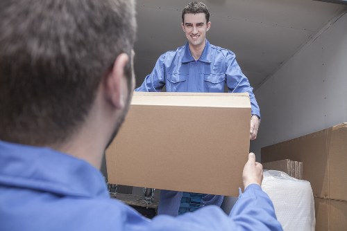 Removal professionals assisting with a move in Cheam