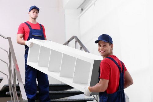 Professional removals team at work in West Hendon