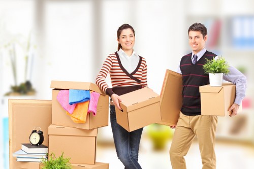 Professional movers handling items during a relocation in Colyers