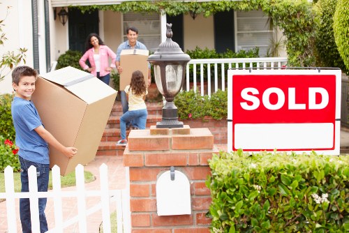 Professional man with van packing items for removal