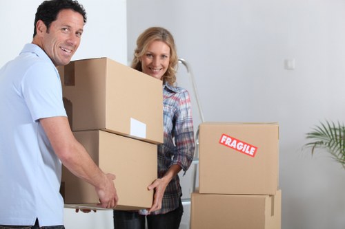 Tommy Removals team loading a van for transport