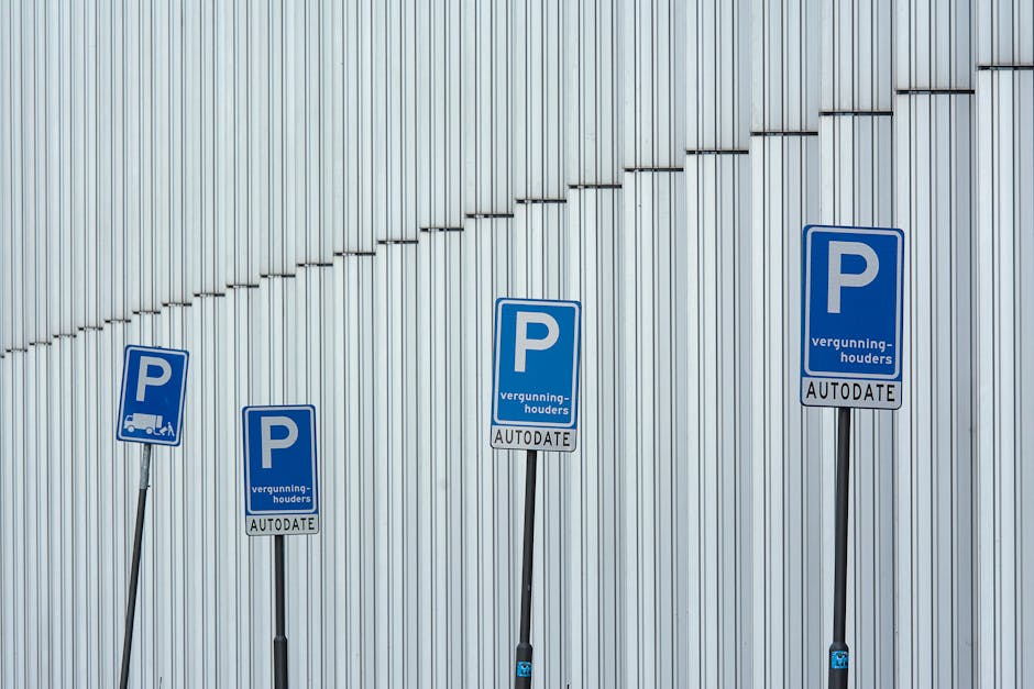 A green and white parking restriction sign mounted on a metal pole outdoors, indicating a two-hour parking limit from 8 am to 8 pm, except on Sundays. The sign has a black bolt at the top and bottom s